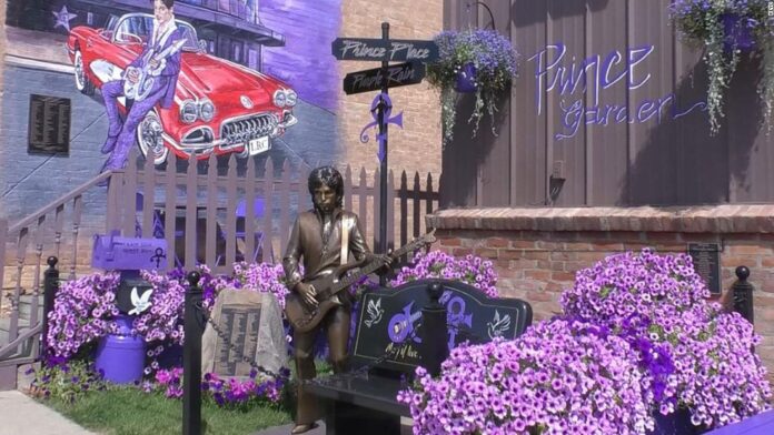 a-town-made-famous-by-‘purple-rain’-unveils-a-life-sized-statue-of-prince