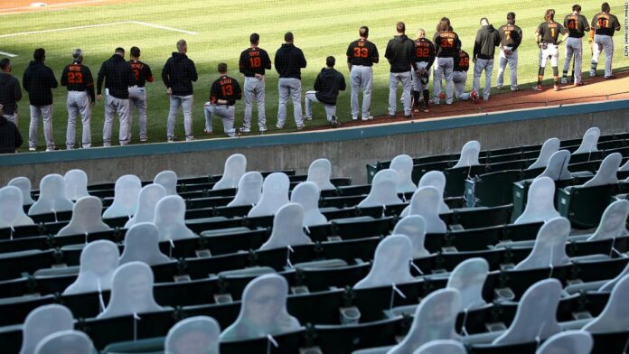 san-francisco-giants’-players-kneel-during-national-anthem-in-exhibition-game-against-oakland