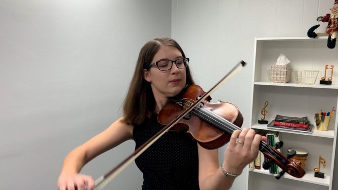 violin-teacher-makes-a-difference-for-kids