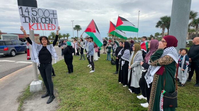 pro-palestine-supporters-hold-rally,-march-outside-tampa-premium-outlets